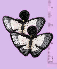 Moth of death statement earrings